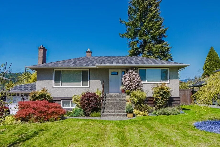 modest-family-house-with-blossoming-flowers